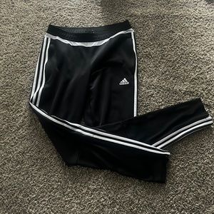 Black Adidas track pants